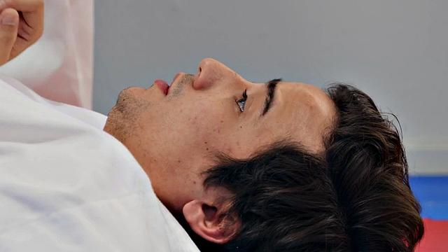 Ebony rides short guy during karate class