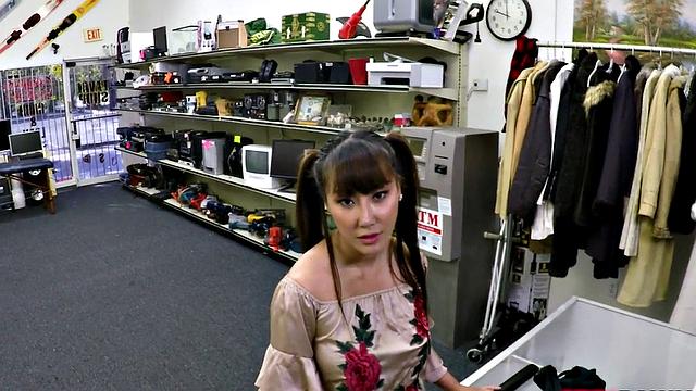 Big-titted Asian babe gets pounded from behind and takes a facial in POV