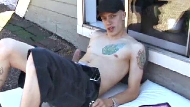 We find Shane enjoying a beautiful day, oblivious to the sounds of traffic on the streets below. Soon he unbuckles and unzips, letting his eager boner poke out.