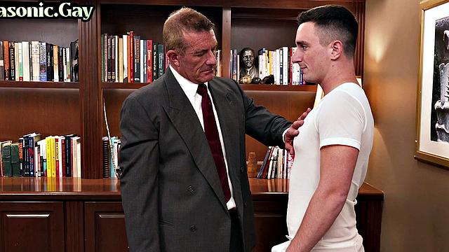 Suited mason fucks ass of bottom stud in office