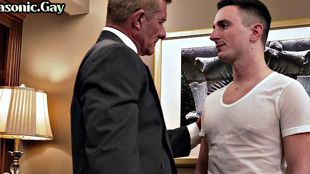 Suited mason fucks ass of bottom stud in office