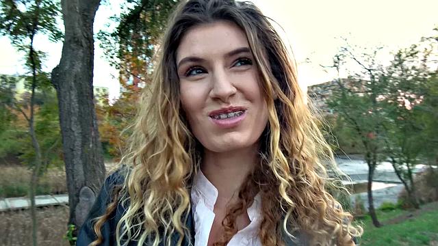 Curly-haired babe gets wild with her public fuck and blowjob