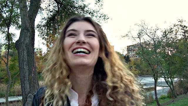 Curly-haired babe gets wild with her public fuck and blowjob