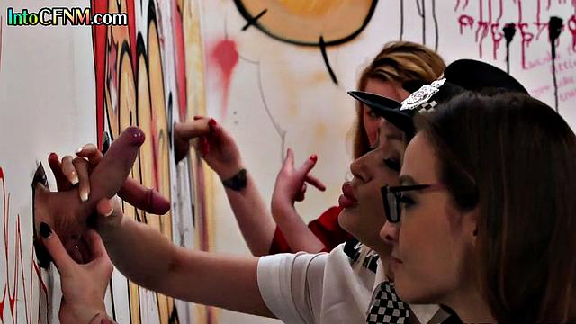 CFNM babes cock sucking in glory hole