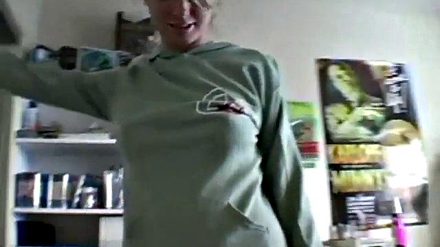 Stripteasing teen showing off her goods