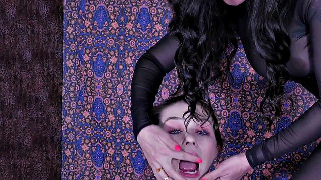 Teen deepthroats dildo in domination scene