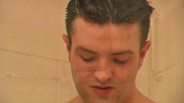 Sexy 21 year old Jeremy West enjoys hot shower and jacks off