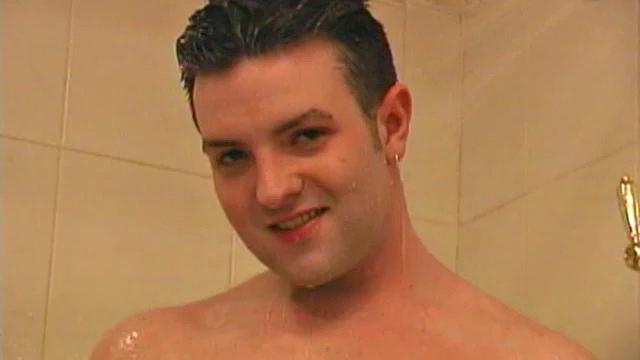 Sexy 21 year old Jeremy West enjoys hot shower and jacks off