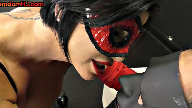 Femdom tugging busty MILF jerks cock while talking