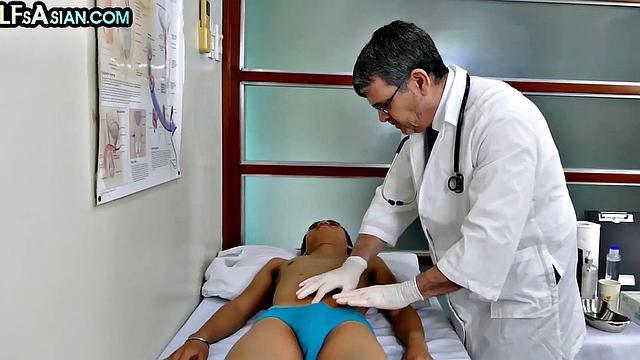 Skinny Asian gets fucked by DILF doctor in infirmary