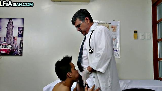 Skinny Asian gets fucked by DILF doctor in infirmary