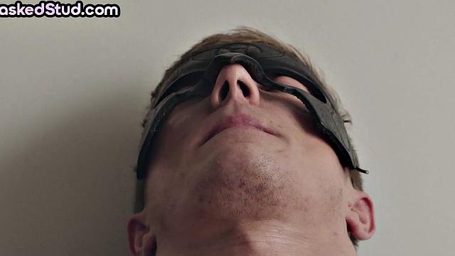 Masked stud with athletic body cums after solo handjob