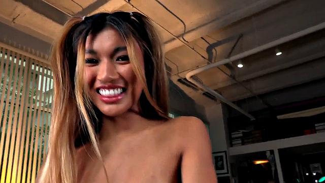 Dirty talking Asian cheerleader gives a titjob and footjob in hot POV action