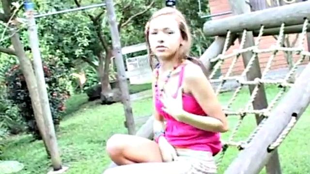 Horny teen masturbating outdoors