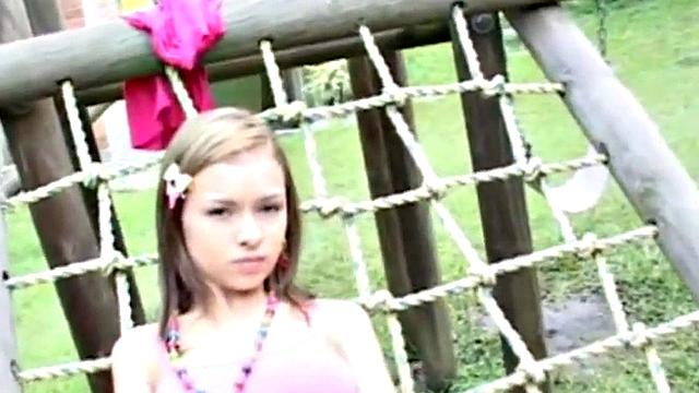 Horny teen masturbating outdoors
