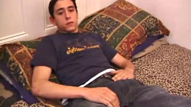 Young Luciano doesn't hesitate to get naked and beat his meat. His sexy bad boy body is tattooed and his low hanging balls bounce and sway in time with his cock stroking. His dick is perfect in every way and he works it like a good friend.