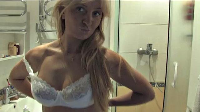 Sexy blonde in solo shower scene