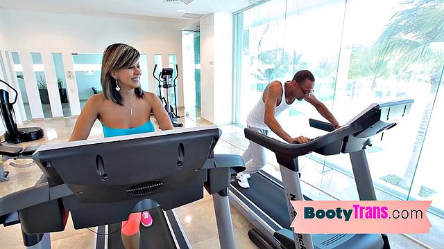 Latina TS with big tits takes on gym instructor's big dick before getting her ass drilled