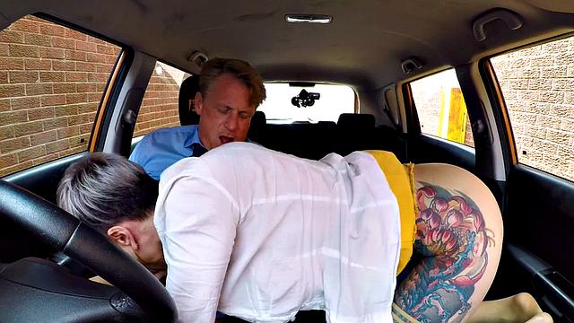 Bigtit inked babe rides in the car after enjoying oral