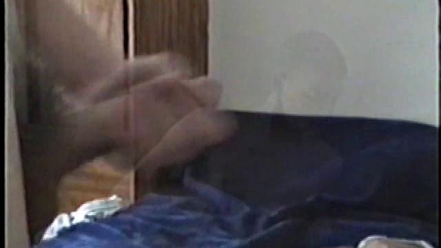 Lance has his stash of magazines next to him, as he strips out of his clothes. This boy enjoys watching himself on the camera's view screen, as much as he likes the magazines alongside him.