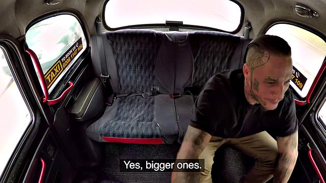 Horny bald chick gets her pussy licked & fucked by a tattooed guy in a taxi