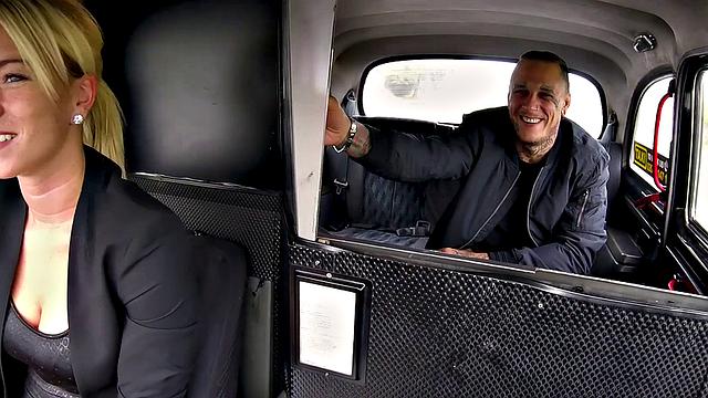 Horny bald chick gets her pussy licked & fucked by a tattooed guy in a taxi