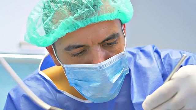 Get a close-up view of a ponytailed babe's mouth getting stuffed with cock and tongue