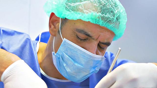 Get a close-up view of a ponytailed babe's mouth getting stuffed with cock and tongue