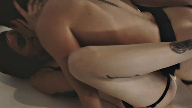 Watch these tattooed lesbian babes go wild with strap-on playtime