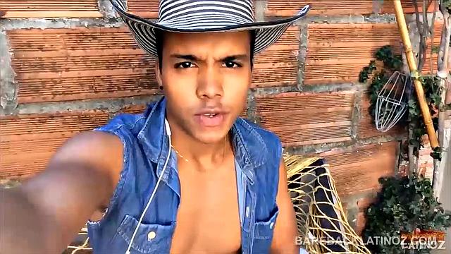 Our featured solo boy of the week is this cute Latin boy, who keeps his hat on the entire video. But, as the shorts peel off we can see a sexy little happy trail that leads to a monster uncut cock.