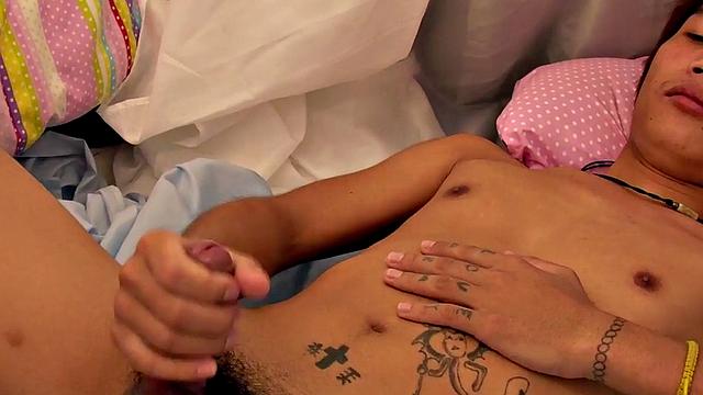 Pissing Asian twink masturbates and cums in solo vid