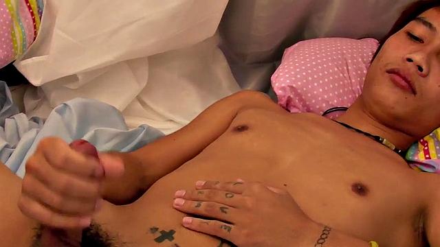 Pissing Asian twink masturbates and cums in solo vid