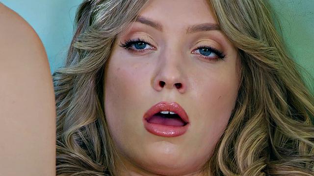 Blonde with trimmed pussy & high heels gets off solo on the couch