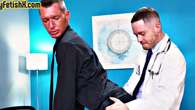 Skinny gay fisted and foot fucked at doctor's office