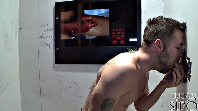 Real guy gets blowjob in gloryhole