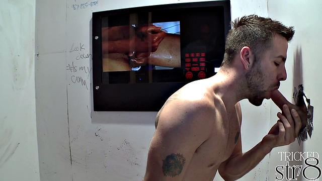 Real guy gets blowjob in gloryhole