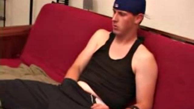 Maxx Wood works his cock under his shorts and then pulls it out to lube up. The man strokes with determination, edging himself a few times, before covering his naked body in a splattering of warm cum.