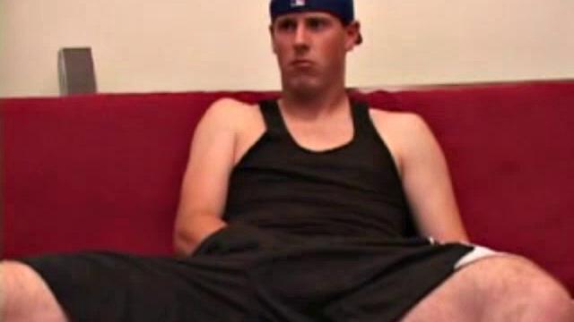 Maxx Wood works his cock under his shorts and then pulls it out to lube up. The man strokes with determination, edging himself a few times, before covering his naked body in a splattering of warm cum.