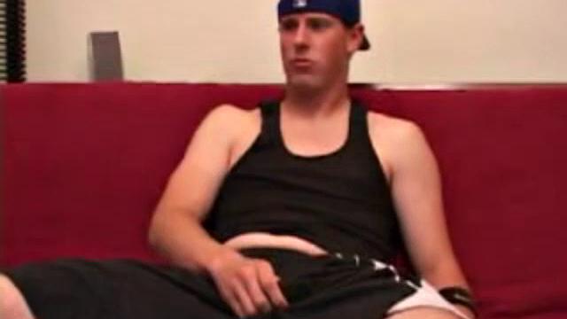 Maxx Wood works his cock under his shorts and then pulls it out to lube up. The man strokes with determination, edging himself a few times, before covering his naked body in a splattering of warm cum.