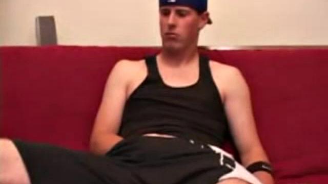 Maxx Wood works his cock under his shorts and then pulls it out to lube up. The man strokes with determination, edging himself a few times, before covering his naked body in a splattering of warm cum.