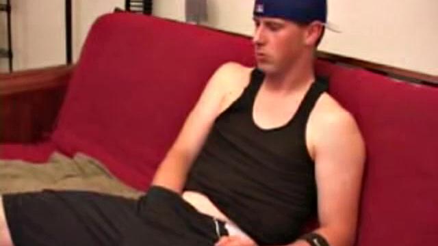 Maxx Wood works his cock under his shorts and then pulls it out to lube up. The man strokes with determination, edging himself a few times, before covering his naked body in a splattering of warm cum.