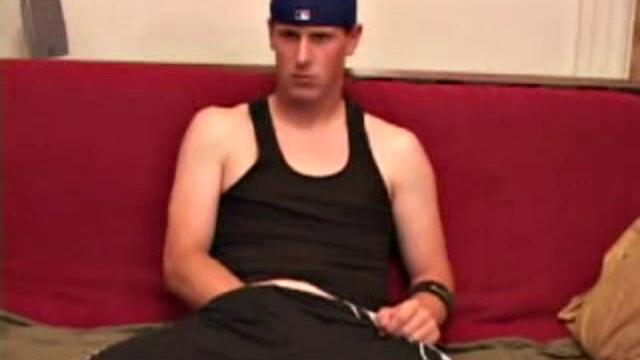 Maxx Wood works his cock under his shorts and then pulls it out to lube up. The man strokes with determination, edging himself a few times, before covering his naked body in a splattering of warm cum.