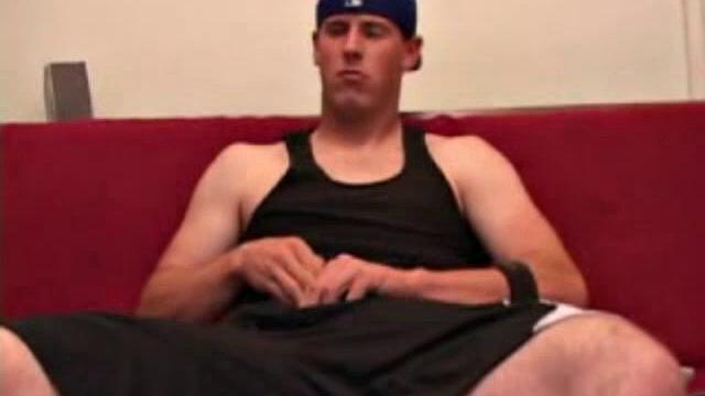 Maxx Wood works his cock under his shorts and then pulls it out to lube up. The man strokes with determination, edging himself a few times, before covering his naked body in a splattering of warm cum.