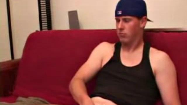 Maxx Wood works his cock under his shorts and then pulls it out to lube up. The man strokes with determination, edging himself a few times, before covering his naked body in a splattering of warm cum.