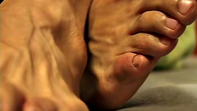 Berto teases us by slowly wiggling his feet and toes - Berto