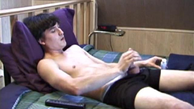 Mickey kicks back on the bed in jeans and a black tank top, while rubbing the stiff dick inside his boxer briefs. Soon enough, he strips them off and gets right up in front of the lens with his slicked up cock.