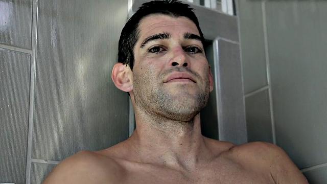 Showering amateur jerks off his long spear for jizz