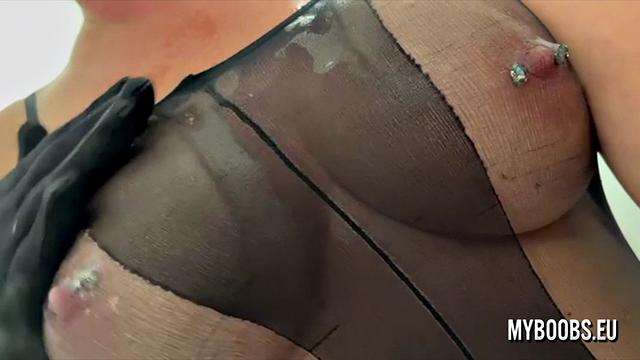 milf spitting cum on tits and pierced nipples