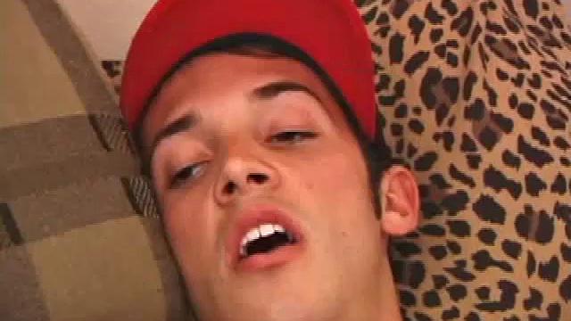 Bryce is alone and horny, so he pops in a porn video and begins stroking. After getting naked, Bryce shows us his ass and lubes up a ribbed anal sex toy. He works his ass with it and is soon busting his nut and licking it up.