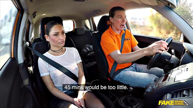 Tattooed brunette fucks for license